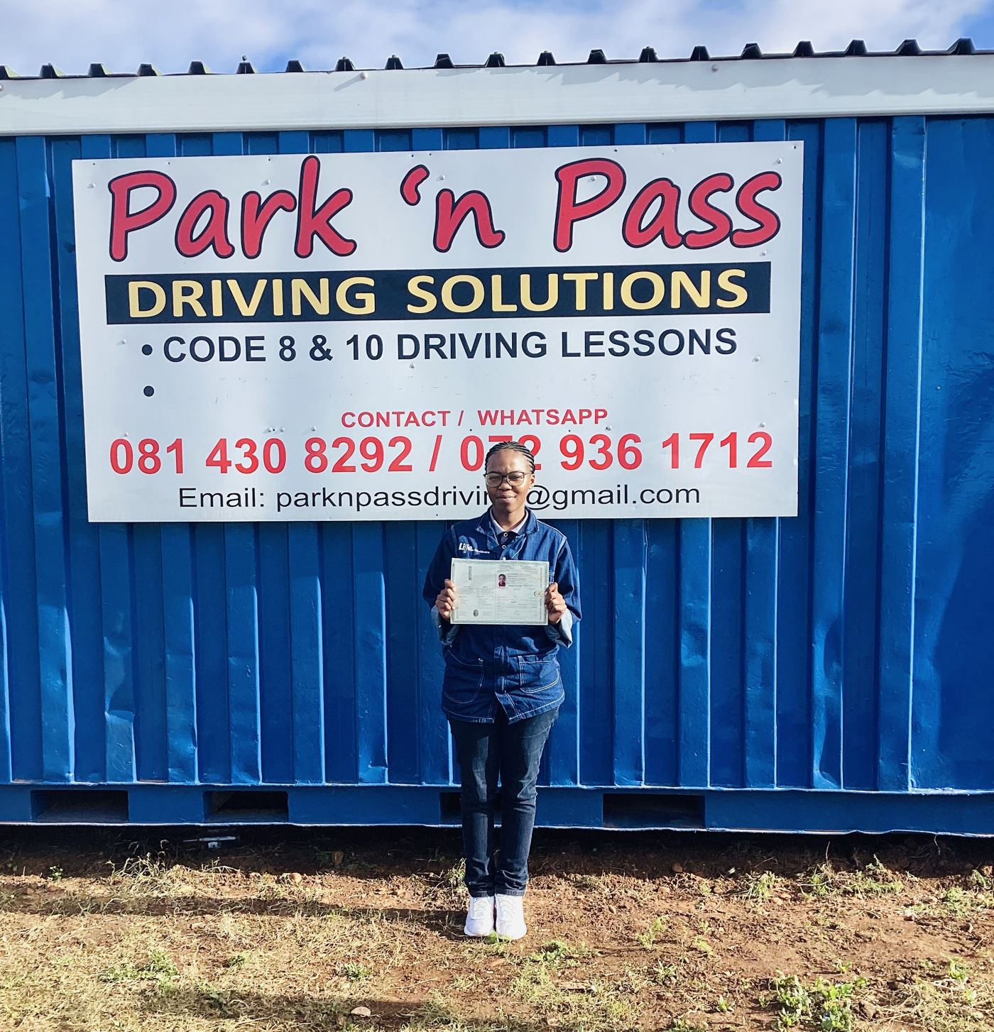 Park 'n Pass student holding their new licence