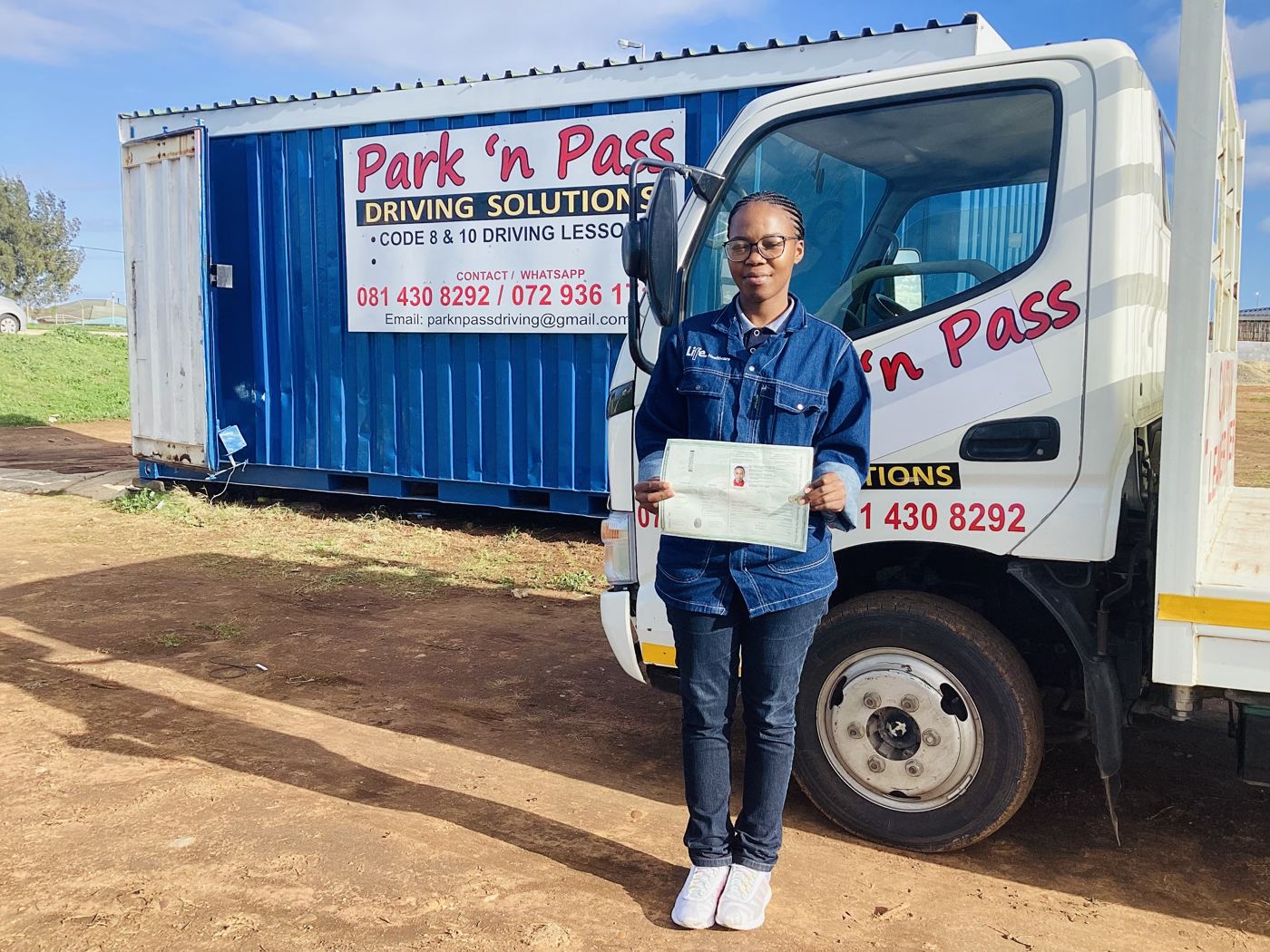 Park 'n Pass student holding their new licence
